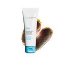 REVEAL gentle radiance violet scrub