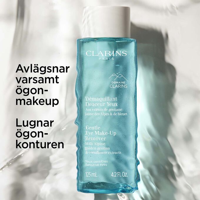 Packshot under vatten av Clarins &ouml;gonmakeupborttagning med text om produktens lugnande och skonsamma egenskaper.