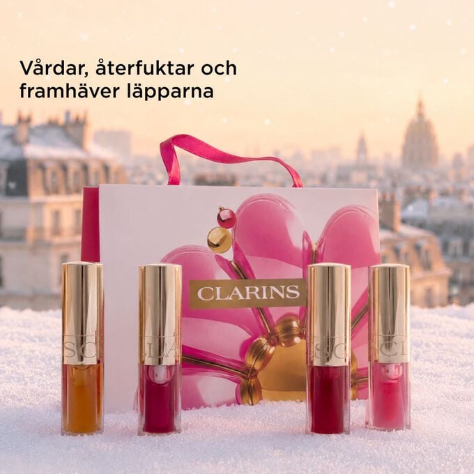 Produktbild av Clarins-julset med l&auml;ppoljor som v&aring;rdar, &aring;terfuktar och framh&auml;ver l&auml;pparna med naturlig glans