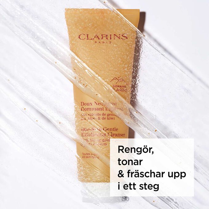 Packshot af den orange tube med ansigtsrens med tekst om dens 3-i-1-effekt: fjerner makeup, renser og eksfolierer.
