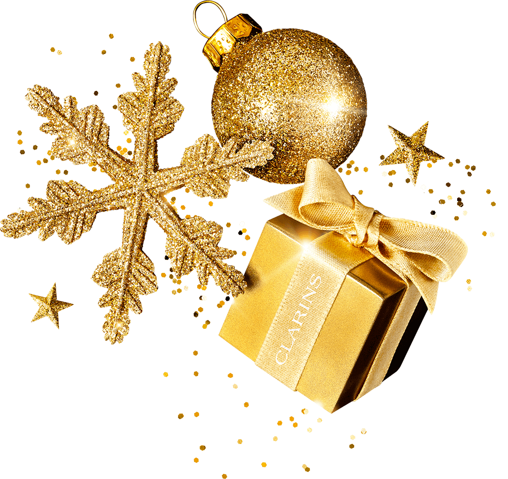 Julpyntskomposition med stjärna och julklapp